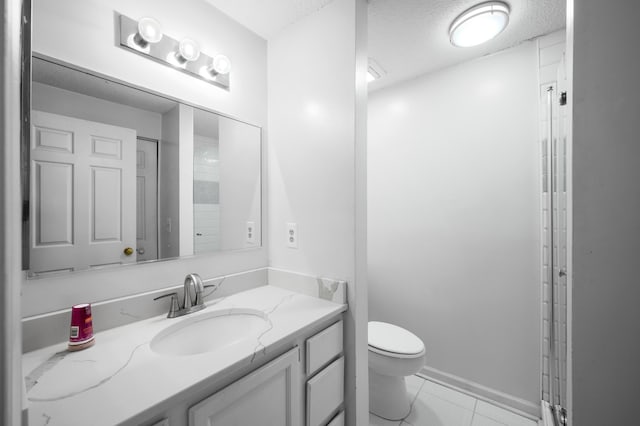 1101 Reserve Way, Summerville, SC 29485 - bathroom with toilet, vanity, tile patterned flooring, and a textured ceiling