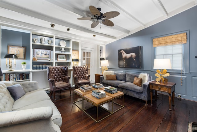 living room with ceiling fan, vaulted ceiling with beams, and dark hardwood / wood-style floors