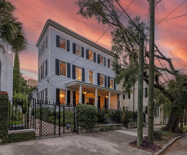 colonial home featuring a porch