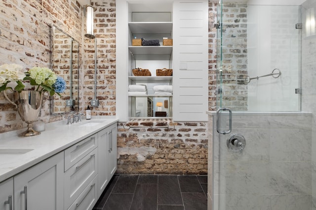 bathroom with walk in shower and vanity