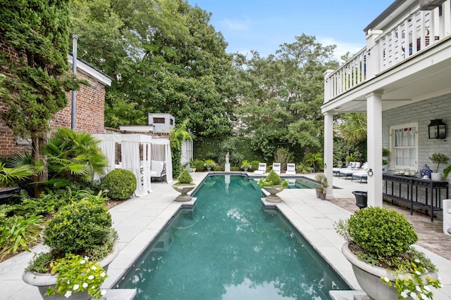 view of pool with a patio area