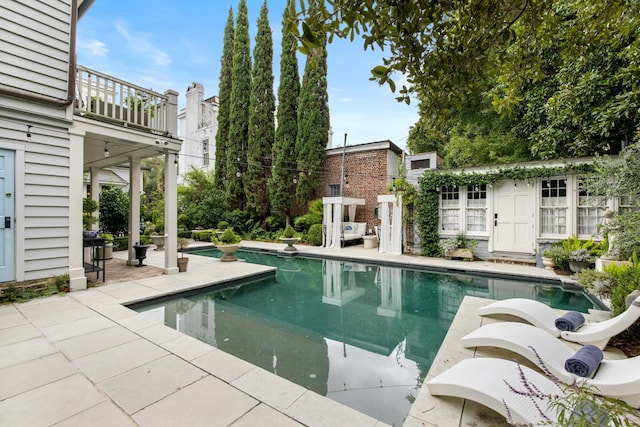 view of pool with a patio area