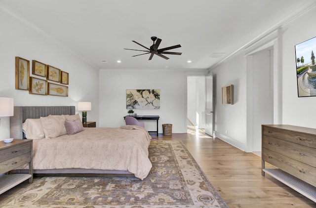 bedroom featuring crown molding, wood finished floors, recessed lighting, and a ceiling fan