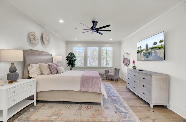 bedroom with baseboards, ornamental molding, recessed lighting, and light wood-type flooring