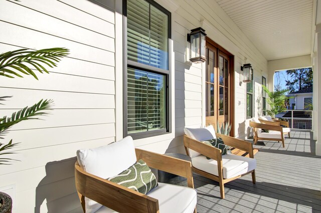 deck featuring covered porch