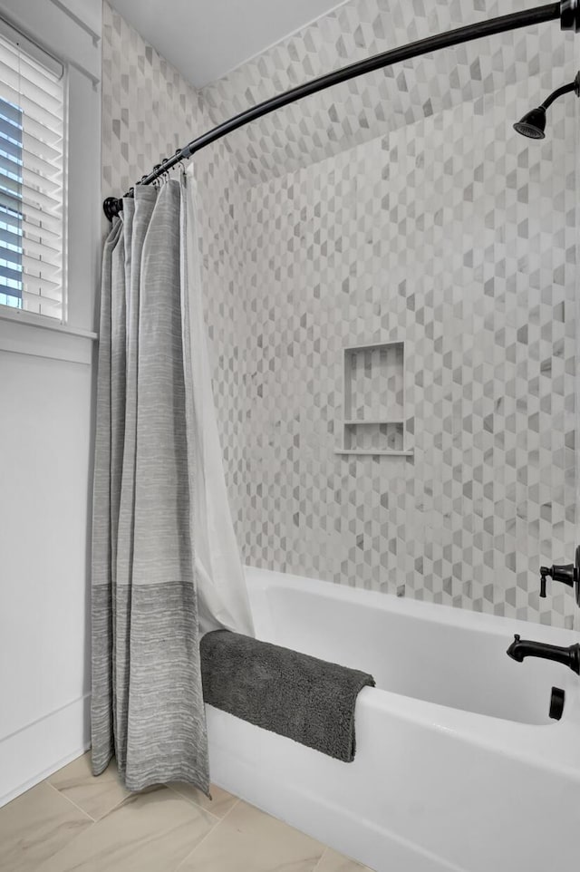 full bathroom featuring shower / tub combo with curtain
