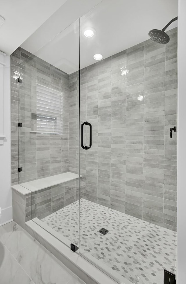 full bath featuring a stall shower