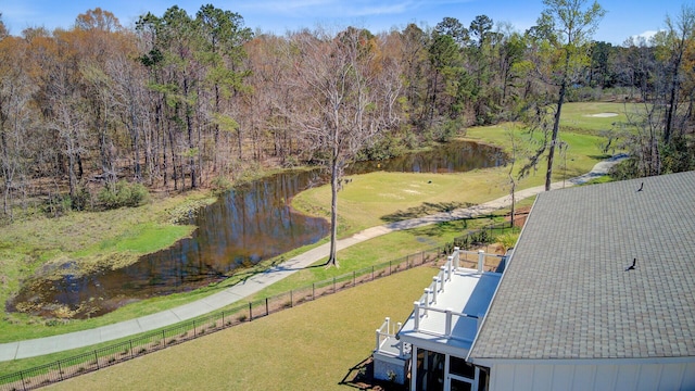 bird's eye view featuring a water view and a view of trees