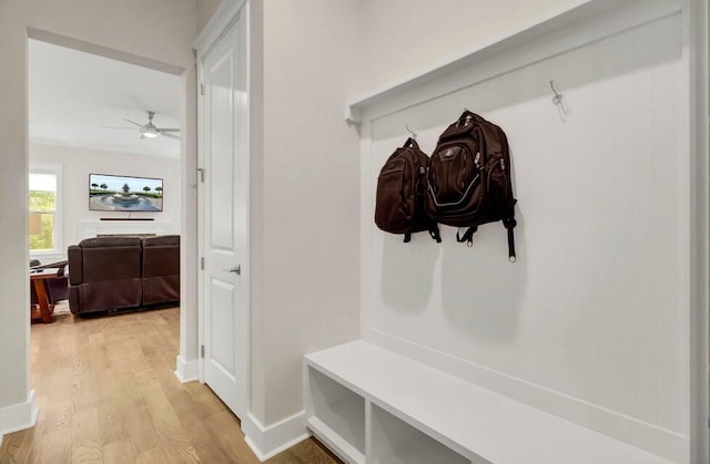 mudroom featuring light wood-type flooring and ceiling fan