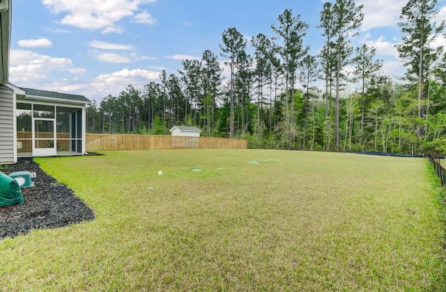 view of yard featuring a sunroom