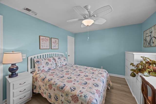 bedroom featuring ceiling fan and light wood-type flooring