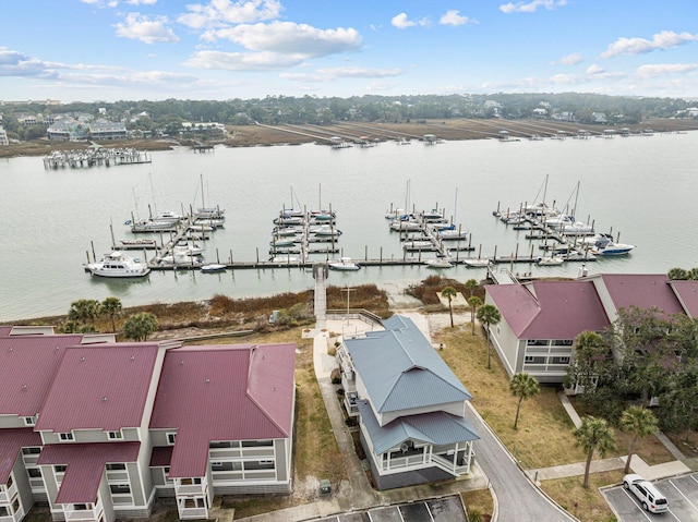 birds eye view of property featuring a water view