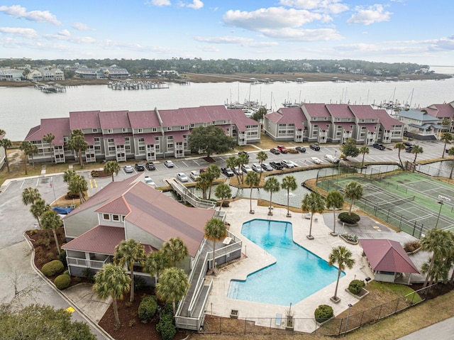 birds eye view of property featuring a water view