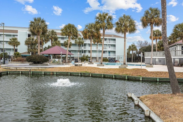 dock area featuring a gazebo and a water view