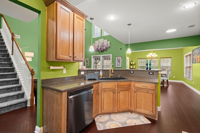 kitchen featuring visible vents, an inviting chandelier, a sink, dishwasher, and a peninsula