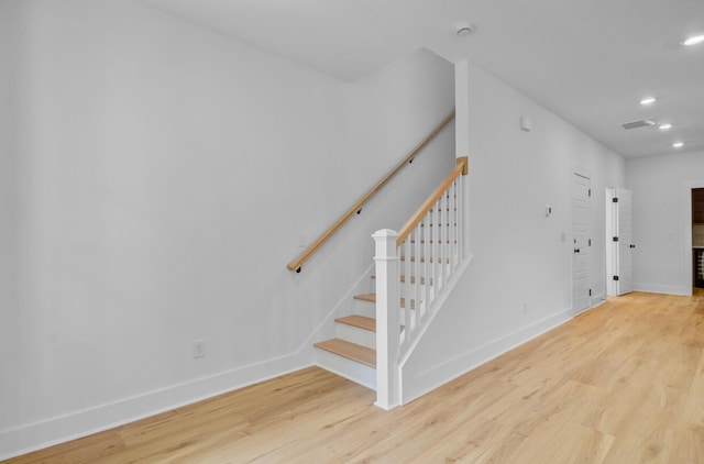 501 Joseph St, Charleston, SC 29412 - staircase featuring wood finished floors and recessed lighting