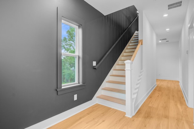 501 Joseph St, Charleston, SC 29412 - stairway featuring healthy amount of natural light, wood finished floors, and recessed lighting