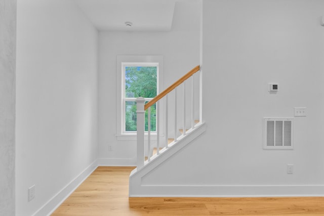 501 Joseph St, Charleston, SC 29412 - stairs with baseboards and wood finished floors