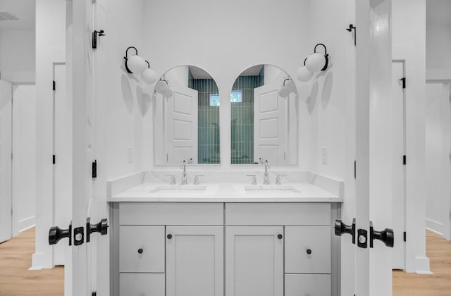 501 Joseph St, Charleston, SC 29412 - bathroom with double vanity and wood finished floors