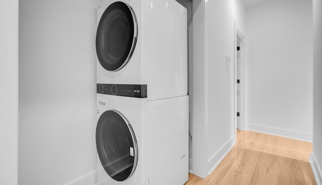 501 Joseph St, Charleston, SC 29412 - washroom with stacked washer and clothes dryer and light wood finished floors