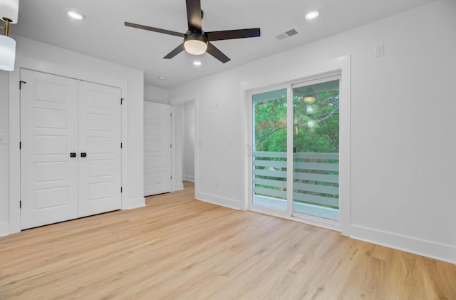 501 Joseph St, Charleston, SC 29412 - unfurnished bedroom with access to outside, light wood-type flooring, recessed lighting, ceiling fan, and a closet