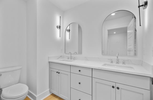 501 Joseph St, Charleston, SC 29412 - bathroom with double vanity and wood finished floors