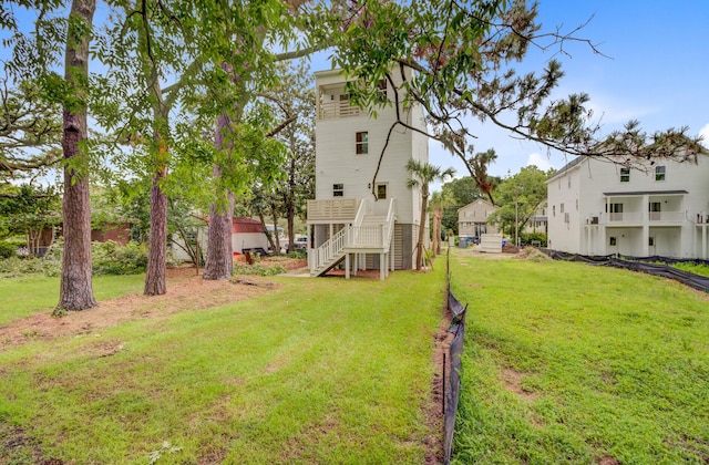 501 Joseph St, Charleston, SC 29412 - view of grassy yard featuring stairway and a deck