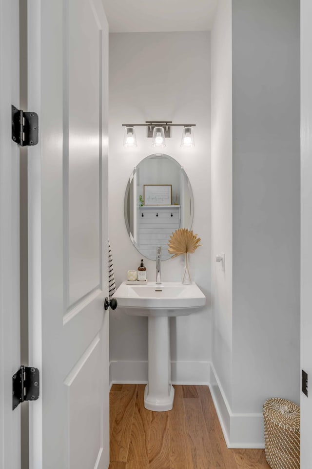 bathroom featuring hardwood / wood-style flooring