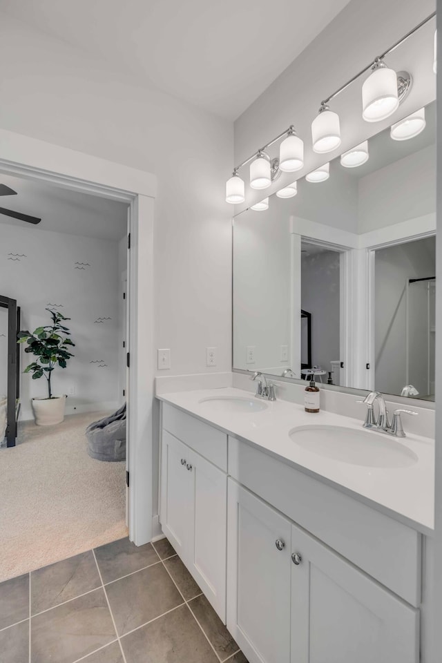 bathroom featuring tile patterned floors and vanity