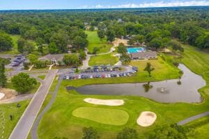 drone / aerial view featuring view of golf course