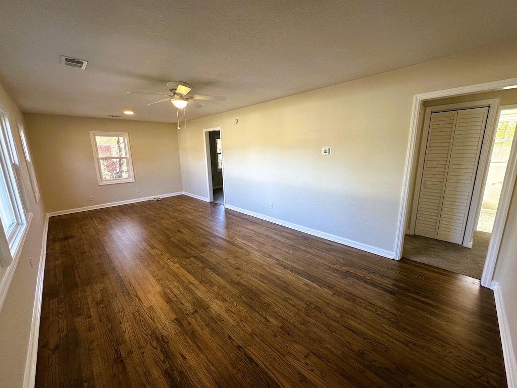 8 Eucalyptus Ave, North Charleston, SC 29418 - unfurnished room featuring baseboards, visible vents, dark wood-style floors, and ceiling fan