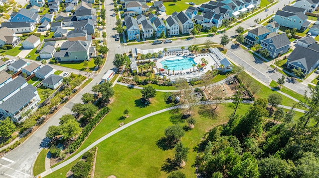 birds eye view of property with a residential view