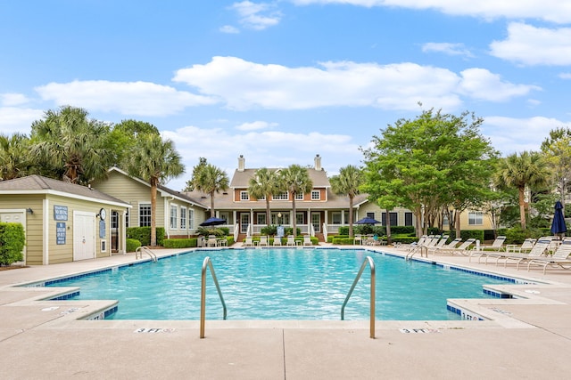 pool with a patio area