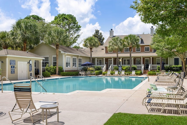 pool featuring a patio area