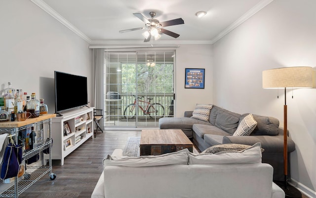 living room with dark wood finished floors, baseboards, crown molding, and ceiling fan