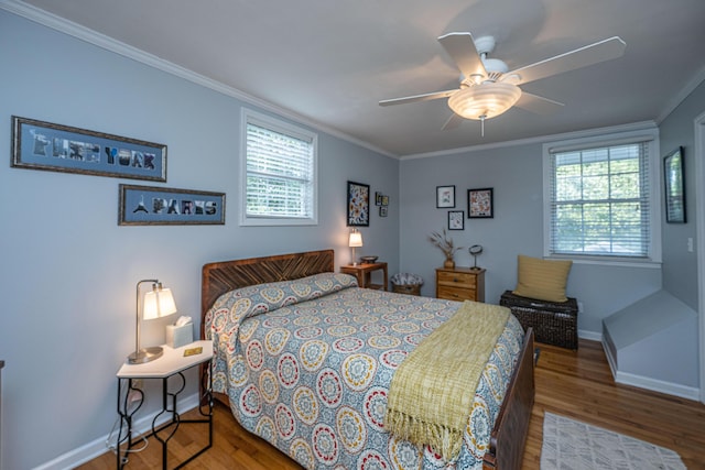 802 Robert E Lee Blvd, Charleston, SC 29412 - bedroom with wood finished floors, crown molding, multiple windows, and ceiling fan