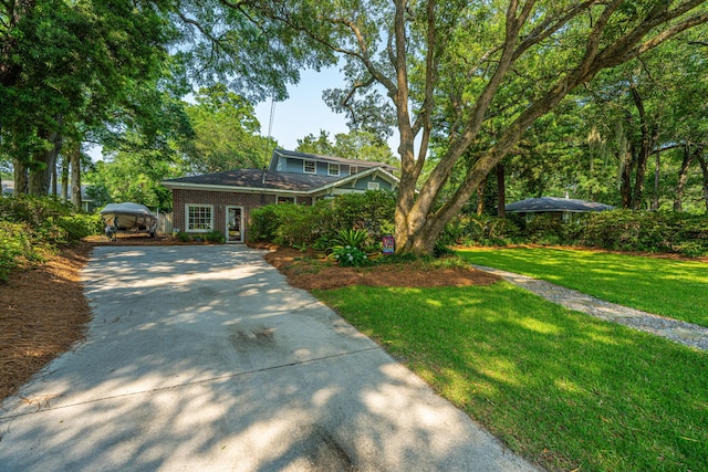802 Robert E Lee Blvd, Charleston, SC 29412 - view of front of property with driveway, a front lawn, a gazebo, and brick siding