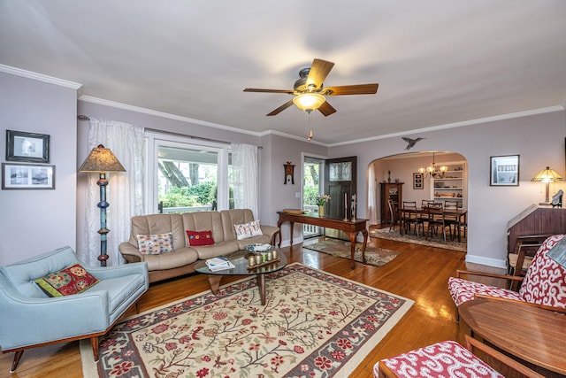 802 Robert E Lee Blvd, Charleston, SC 29412 - living room featuring arched walkways, wood finished floors, ornamental molding, a chandelier, and a ceiling fan