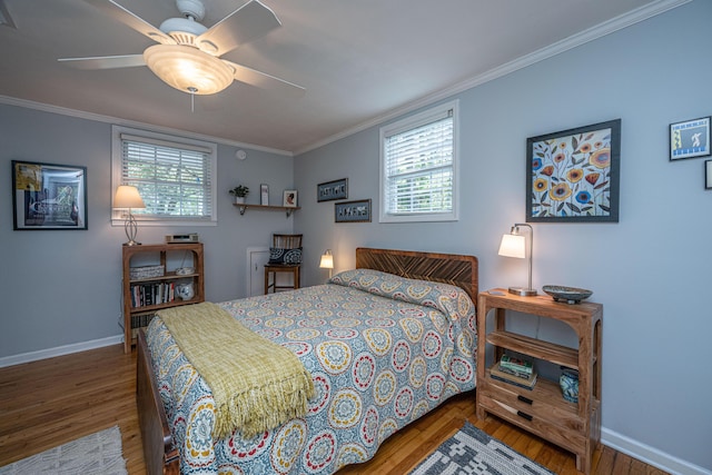 802 Robert E Lee Blvd, Charleston, SC 29412 - bedroom featuring wood finished floors, crown molding, multiple windows, and ceiling fan