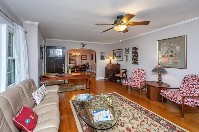802 Robert E Lee Blvd, Charleston, SC 29412 - living area with arched walkways, hardwood / wood-style floors, crown molding, a ceiling fan, and a chandelier