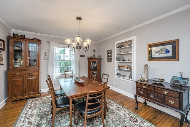802 Robert E Lee Blvd, Charleston, SC 29412 - dining room with a chandelier, wood finished floors, crown molding, and built in features