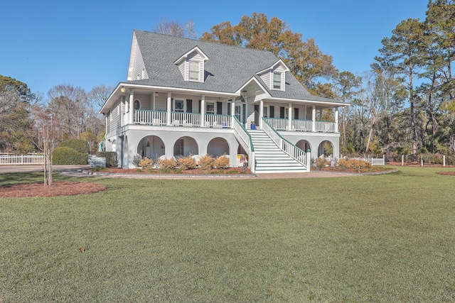 view of front of house featuring a front lawn and a porch