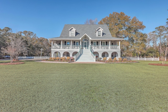 view of front of house featuring a porch and a front yard