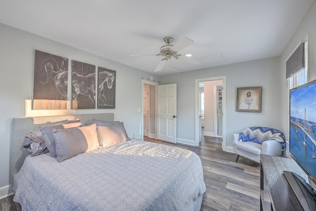 bedroom featuring hardwood / wood-style floors and ceiling fan