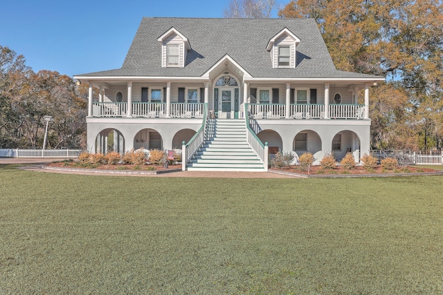 view of front of home featuring a front lawn and a porch