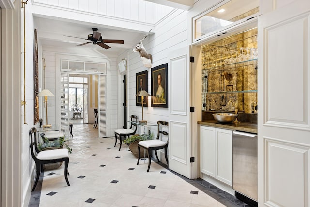 interior space with a ceiling fan