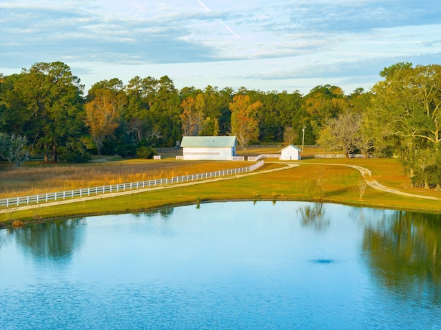 view of water feature with fence