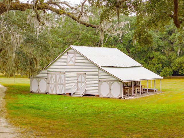 view of outbuilding featuring an outdoor structure