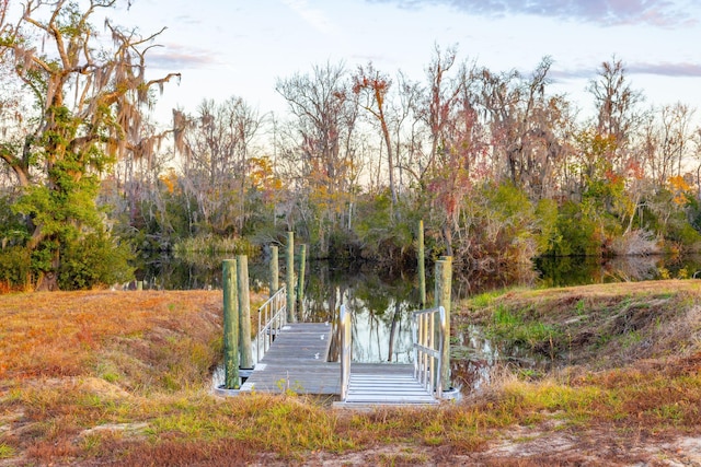 view of dock with a water view