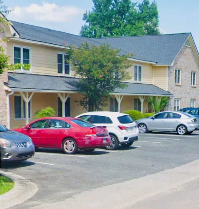 2150 Spoleto Ln Unit B-6, North Charleston, SC 29406 - view of front of property with uncovered parking and a shingled roof